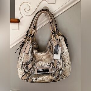 Coach bag. Snakeskin. Brand new carried twice. Gorgeous
